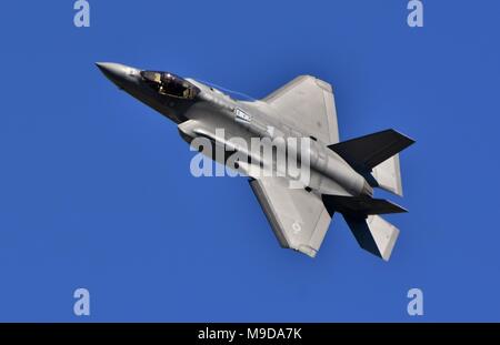 A U.S. Air Force F-35 Joint Strike Fighter (Lightning II) jet flying. This F-35 is assigned to the 33rd Fighter Wing from Eglin Air Force Base. Stock Photo