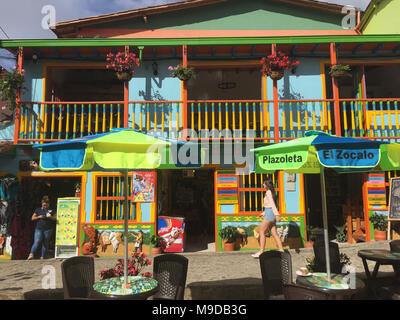 Guatape, Colombia - february 2018: Colorful streets and ornate houses of the city of Guatape near Medellin, Antioquia, Colombia Stock Photo