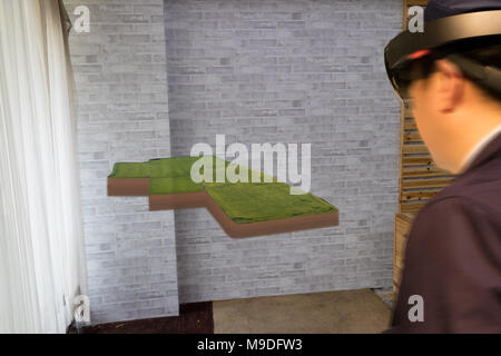 iot smart industry 4.0 agriculture concept,agronomist,farmer(blurred) using smart glasses (augmented mixed virtual reality,artificial intelligence tec Stock Photo