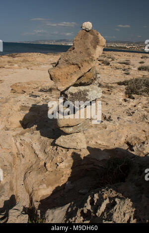 Rock stack on kato-paphos beach on the mediterranean coast of cyprus, europe Stock Photo