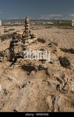 Rock stack on kato-paphos beach on the mediterranean coast of cyprus, europe Stock Photo
