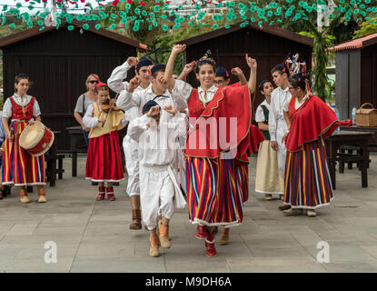 Dancers in traditional costume performing a Madeiran folk dance Stock Photo