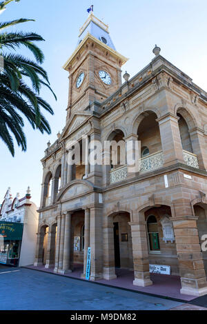 View of the Town Hall and clock tower, designed by Willoughby Powell and built in 1888 from sandstone to last, in Warwick, Queensland, Australia. Stock Photo