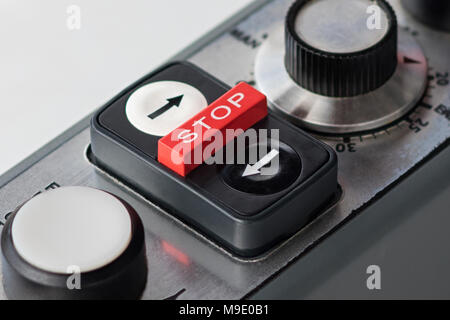 Detail of a remote control with a stop button Stock Photo