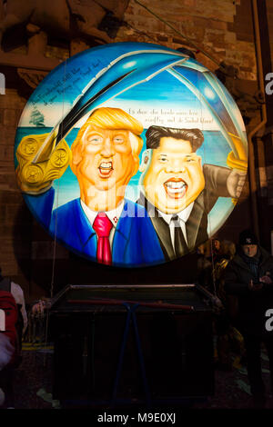 Muensterplatz, Basel, Switzerland - February 20th, 2018. Basel carnival. Illuminated carnival lantern featuring Donald Trump and Kim-Jong Un Stock Photo