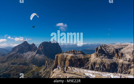 Paragliders, paragliding above Sella group, Sella Towers and Piz Boe, Dolomite, Val di Fassa, Trentino Province, Italy Stock Photo