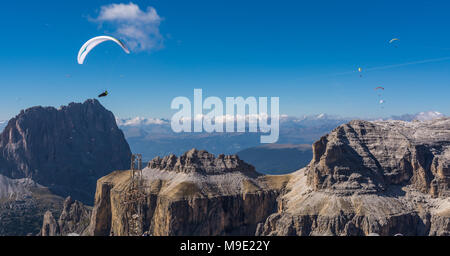 Paragliders, paragliding above Sella group, Sella Towers and Piz Boe, Dolomite, Val di Fassa, Trentino Province, Italy Stock Photo