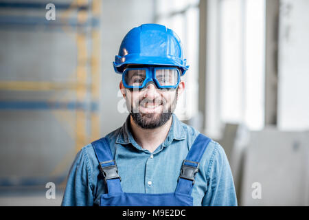 Builder in uniform indoors Stock Photo