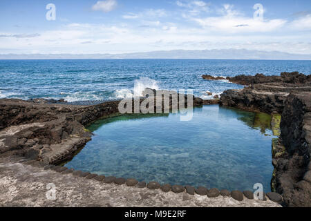 Artificial beach and safe place for swimming on the Atlantic coast, Pico island, Azores Stock Photo