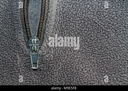 Zipper clothing gray jacket macro background Stock Photo