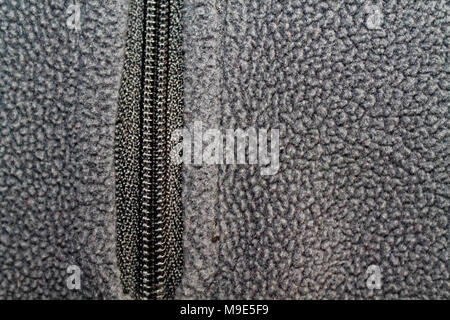 Zipper clothing gray jacket macro background Stock Photo