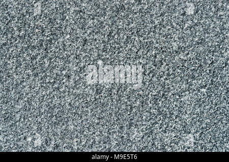 Elegant polished decorative plate made of dark grey granite stone Stock Photo