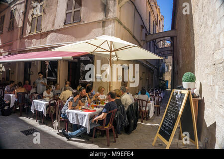 Idyllic restaurant at old town of Bonifacio, Corsica, France, Mediterranean, Europe Stock Photo