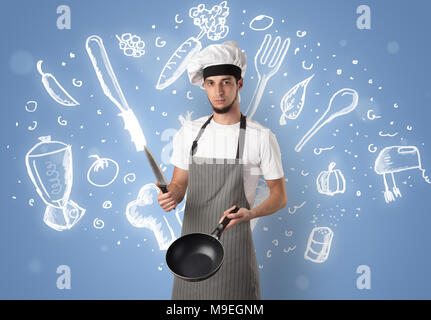Young cook with kitchen instruments and drawn recipe concept on Young cook with kitchen instruments and drawn recipe concept on