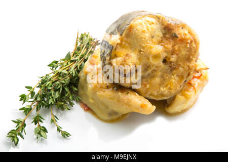 A simple fish stew comprising conger eel cutlets simmered in fried onion, tomato, garlic cloves, thyme, saffron and fish stock. Dorset England UK GB Stock Photo