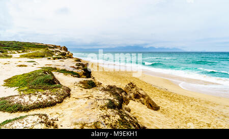 The beautiful beaches on False Bay along Baden Powell Drive between Macassar and Muizenberg near Cape Town, South Africa Stock Photo