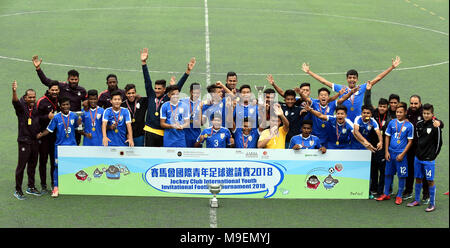 Hong Kong, China. 25th Mar, 2018. Team India celebrate during the awarding ceremony for Jockey Club International Youth Invitational Football Tournament 2018 at Po Kong Village Road Park Artificial Turf Football Pitch in Hong Kong, south China, on March 25, 2018. Team India defeated Hong Kong of China with 4-2 and claimed the title after their third straight win on Sunday. Credit: Lo Ping Fai/Xinhua/Alamy Live News Stock Photo