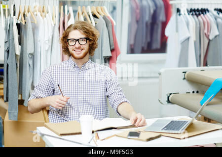 The young designer thinking about a new collection Stock Photo