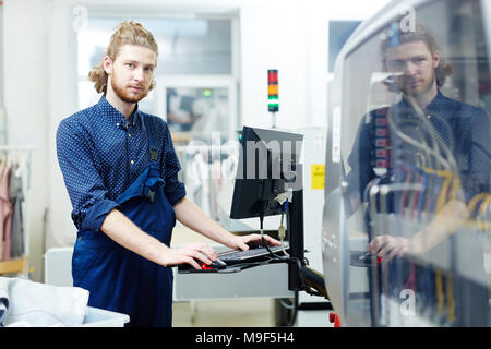 Portrait of young man in printing house Stock Photo