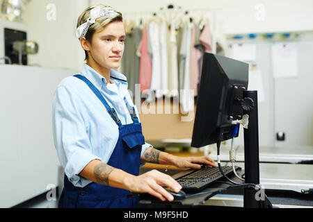 The operator with computer in the printing house Stock Photo