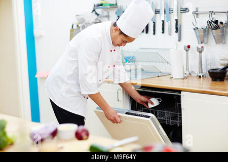 Chef working in the kitchen Stock Photo