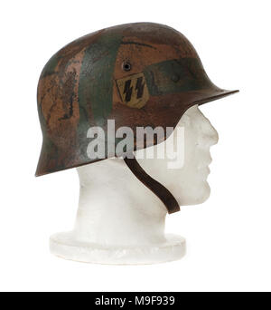 WW2 German Third Reich 'SS' steel helmet (M40 Stahlhelm) from 1940 with original Swastika and SS decals, made by Eisen und Huttenwerke A.G. Thale. Stock Photo