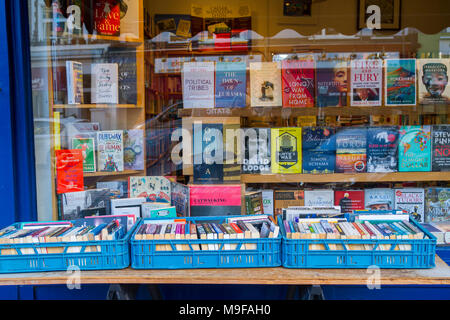 Primrose Hill Books, Old fashioned bookshop, bookstore with crates of secondhand books outside stacked, London UK window book display, window display, Stock Photo