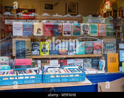 Primrose Hill Books, Old fashioned bookshop, bookstore with crates of secondhand books outside stacked, London UK window book display reading concept Stock Photo