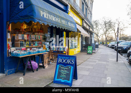 Primrose Hill Books, traditional bookshop, bookstore book shop with crates of secondhand books outside stacked, London UK learning knowledge education Stock Photo