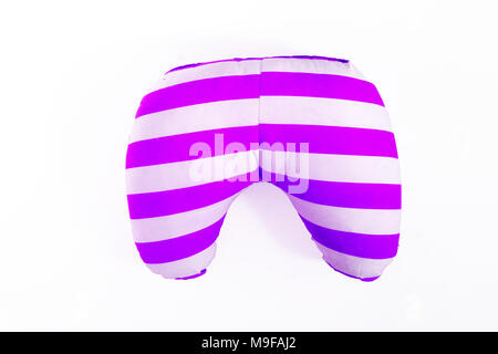 colored striped road travel pillow isolated on white background. Stock Photo