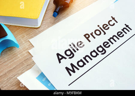 Document Agile Project Management on a table. Stock Photo