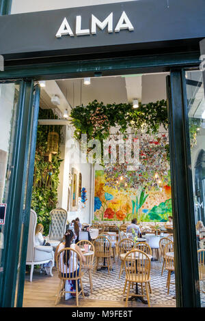 Buenos Aires Argentina,Estacion Retiro train station,Alma Cafe,restaurant restaurants food dining cafe cafes,interior inside,dining,decor,table,mural, Stock Photo