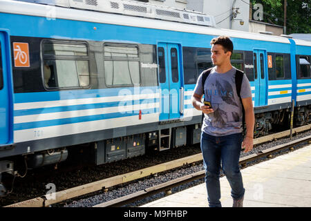 Buenos Aires Argentina,Belgrano C Train Station,railway,platform,commuter,waiting,train,adult adults man men male,young adult,student students educati Stock Photo