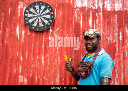 A street vendor with his darts at the Mount Hagen Cultural Show in the Western Highlands, Papua New Guinea. Stock Photo
