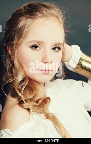 Fashion Portrait of Young Blonde Teen Girl Fashion Model with Makeup and Hairstyle Stock Photo