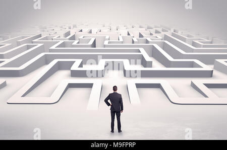 Businessman getting ready to enter a 3D flat labyrinth concept  Stock Photo