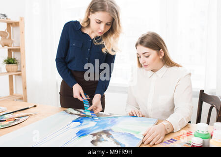 Fashion designers working in team Stock Photo