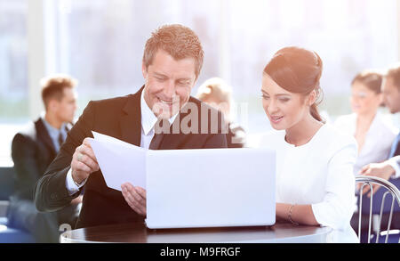 business partners discussing documents, sitting at the table.photo with copy space Stock Photo