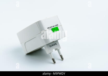 Universal plug adapters for travel around the world isolated on white background. Stock Photo