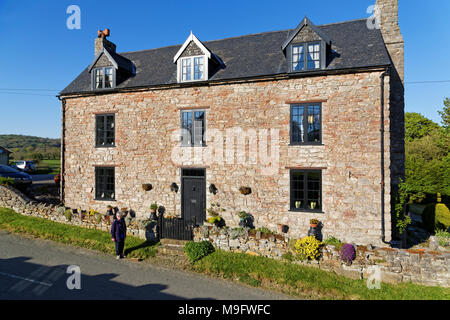 42,506.01574 longtime married woman living in a 3-story 500 yr old stone house, that was once a pub tavern Stock Photo