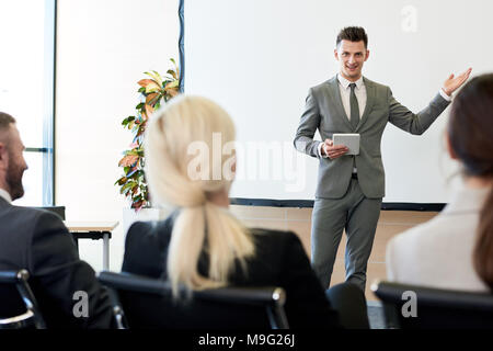 Business Coach Giving Speech Stock Photo
