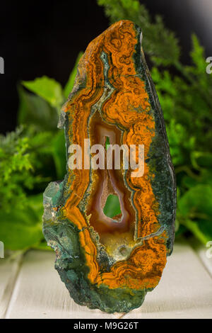 A slice of blue agate crystal on white background Stock Photo