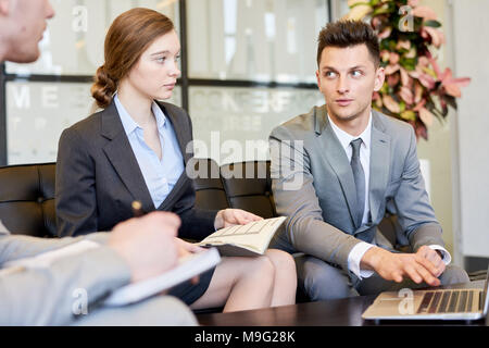 Business Team Working on Project Stock Photo