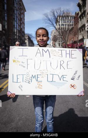 Washington D.C, USA. 24th Mar, 2018. A protester seen holding a placard during the ''March for our Lives'' demonstration.Hundreds of thousands of students, teachers, parents and survivors of mass shootings gathered in Washington D.C on Saturday 24, 2018. To demand an end to all the gun violence around the nation. Students who have survive and be directly affected by gun violence haven been the faces of the march. The march was organized by students who survive the mass shooting last month at Marjory Stoneman Douglas High School in Parkland, FLA. (Credit Image: © Carlos Bernate/SOP Stock Photo