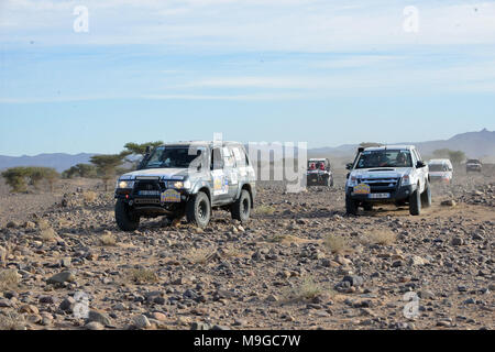 Errachidia, Morocco. 25th Mar, 2018. French Gaelle Bia and Annette Carcaud drive their veichle (L) during the the 4X4/ Truck Class Stage 4 of 2018 Rallye Aicha des Gazelles du Maroc in the region of Errachidia, Morocco, on March 25, 2018. The Rallye Aicha des Gazelles du Maroc is a rally which is held in the deserted parts of southern Morocco and participants are restricted to women only. Credit: Aissa/Xinhua/Alamy Live News