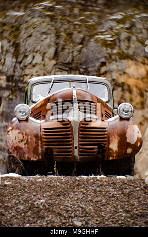 The front of an old, rusty 1941 Dodge pickup truck, in an stone quarry, east of Clark Fork Idaho. Stock Photo