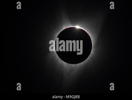Baily's Beads phase of the total solar eclipse, with prominences and corona visible, on August 21 2017, from Dallas Oregon Stock Photo