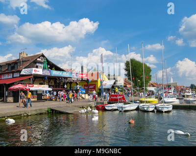 Marina on Mikolajskie lake. Townscape of Mikolajki. Masurian Lakes District. Warmian-Masurian province, Poland. Europe. Stock Photo