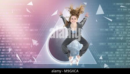 Cool young woman jumping with digital technology interface broken shapes Stock Photo