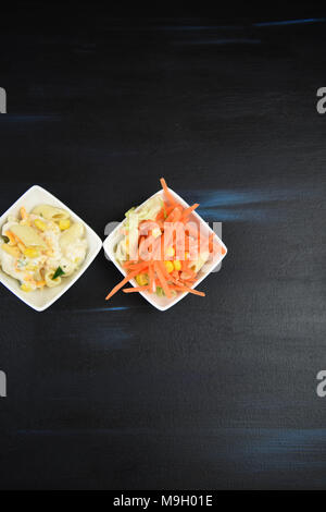 flat lay with dishes of pasta salad Stock Photo